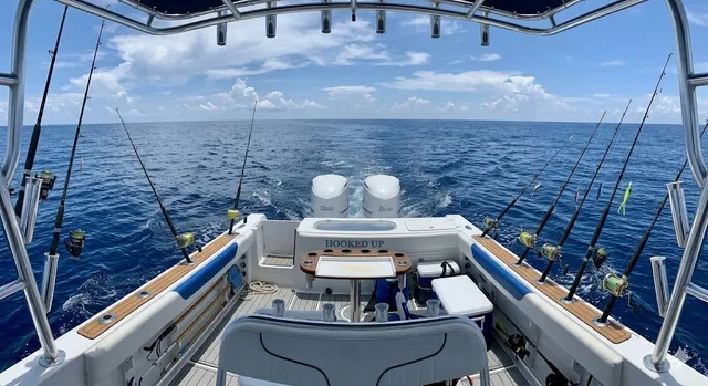 Offshore charter fishing boat on the Gulf of Mexico with fishing rods ready, representing Texas Gulf Coast charter trips